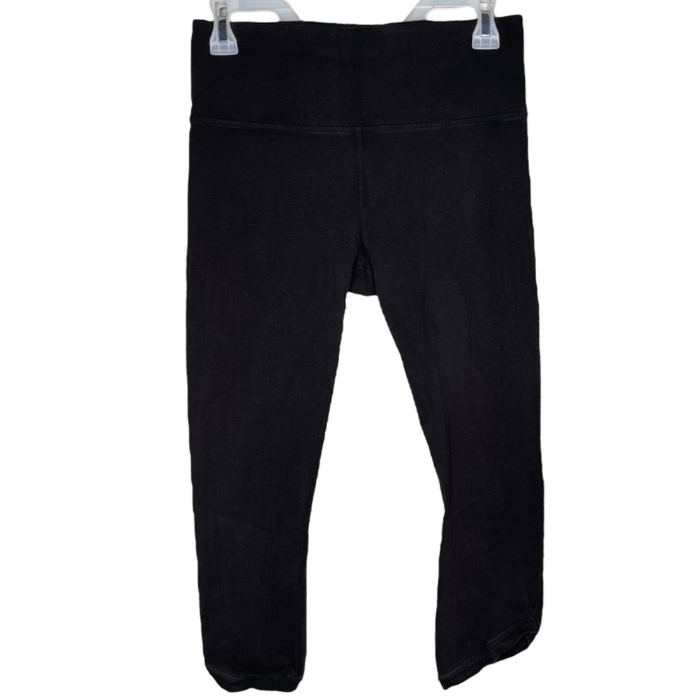 Athleta athletic leggings black cropped slanted angled hems women’s size medium
